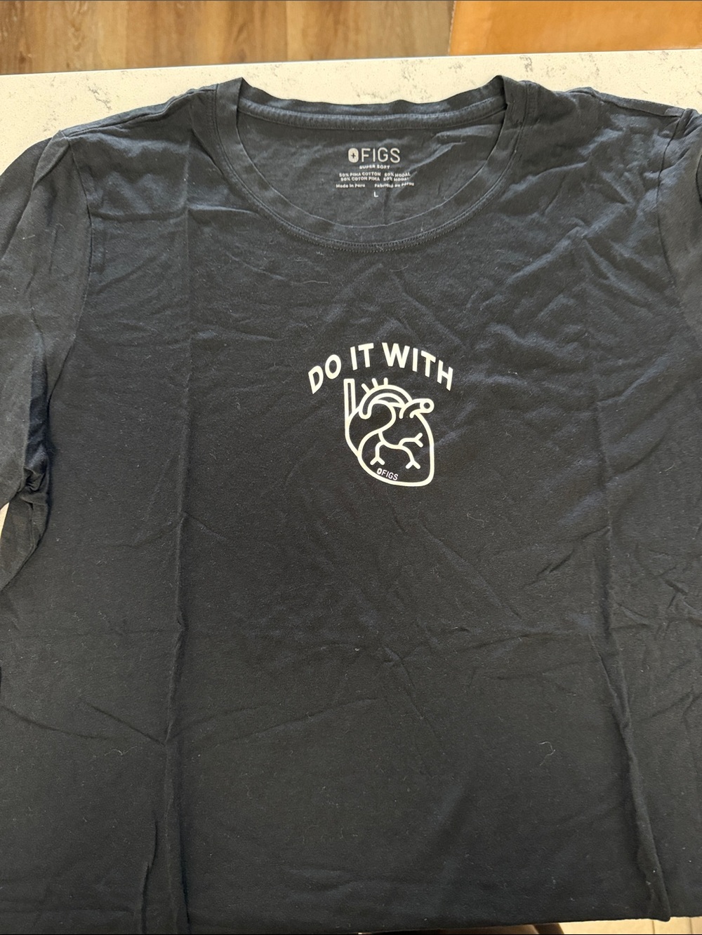 Figs Black Short-Sleeve Tee with White Heart Graphic and "Do It With Heart" Text